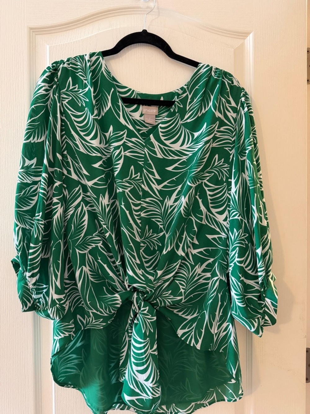 Chico's Tie Front Popover Blouse featuring a green and white palm leaf print.